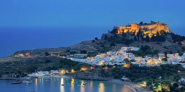 View towards the Acropolis of Lindos at dusk, Rhodes Island, Dodecanese, Greece