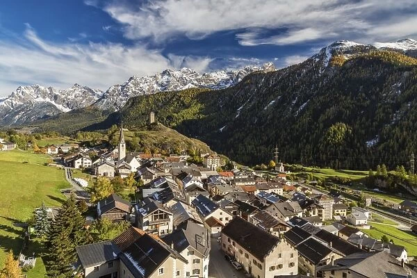 View of Ardez village surrounded by woods and snowy peaks Lower Engadine Canton of