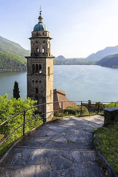 View of the bell tower and church of Santa Maria del Sasso church from the trail to