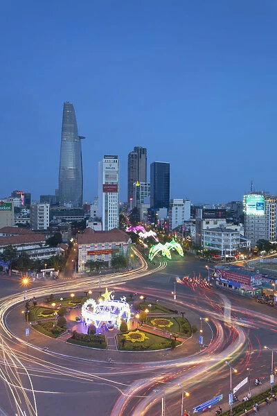 View of Bitexco Financial Tower and city skyline at dusk, Ho Chi Minh City, Vietnam