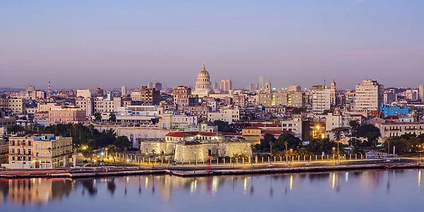 View over Castle of the Royal Force and Habana Vieja towards El Capitolio at dawn, Havana