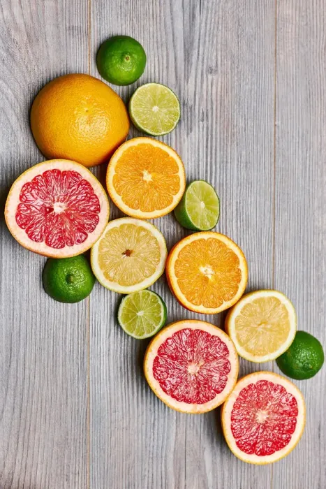 Framed Print : Top view of citrus fruits on white wooden table Framed Print : Top view of citrus fruits on white wooden table