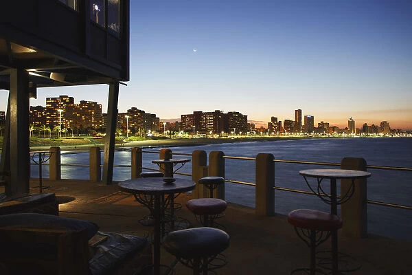 View of city skyline from Moyo restaurant on Addington Beach pier, Durban, KwaZulu-Natal