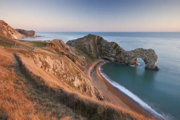 Framed Print : View from cliff tops down into Durdle Door, Dorset, England. Winter Framed Print : View from cliff tops down into Durdle Door, Dorset, England. Winter
