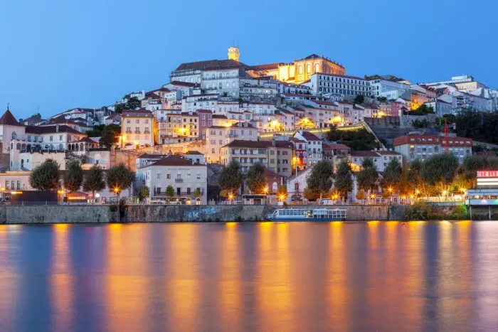 Framed Print : View of Coimbra ol town and Mondego River at dusk. Coimbra, Coimbra district