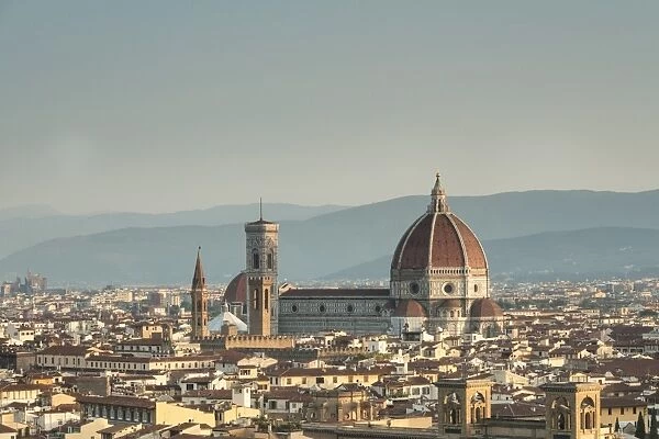 View of the Duomo with Brunelleschi Dome and Basilica di Santa Croce from Piazzale