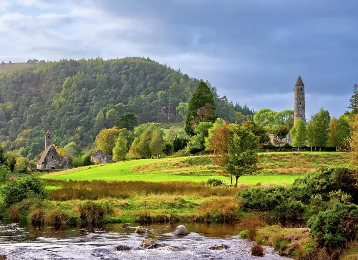 Framed Print : View over Glendasan River towards St. Kevin's Church and The Round Tower at sunset, Early Medieval Monastic Settlement, Glendalough, County Wicklow, Ireland
