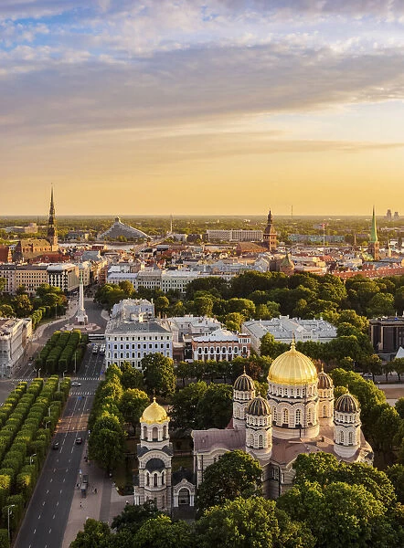 View over the Golden Domes of the Nativity of Christ Orthodox Cathedral towards the Old Town at sunset, Riga, Latvia