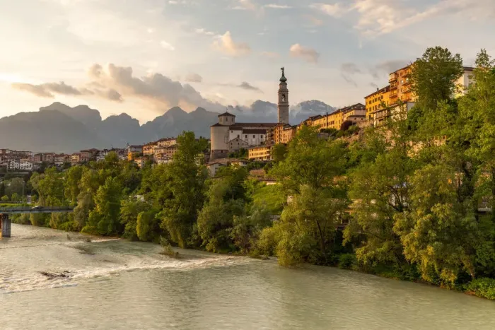 Framed Print : View of the historic center of Belluno with the Piave river flowing at sunset Framed Print : View of the historic center of Belluno with the Piave river flowing at sunset