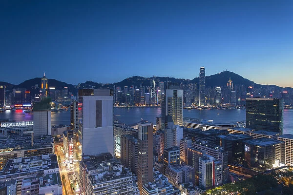 View of Hong Kong Island and Tsim Sha Tsui skylines at dusk, Hong Kong