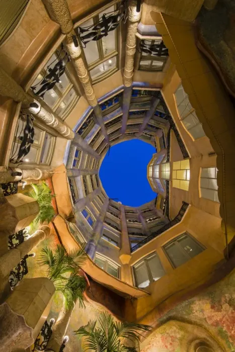 Framed Print : Bottom view of the inner courtyard of Casa Mila or La Pedrera at dusk, Barcelona Framed Print : Bottom view of the inner courtyard of Casa Mila or La Pedrera at dusk, Barcelona