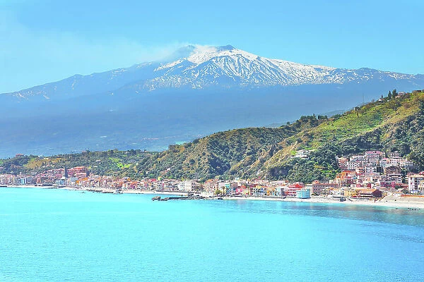 View of the Ionian coast and mount Etna in the distance, Taormina, Sicily, Italy
