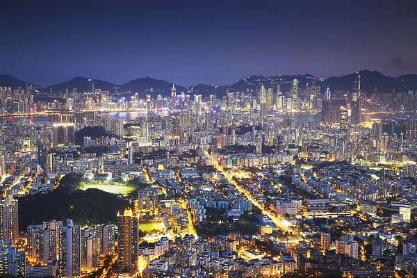 View of Kowloon and Hong Kong Island from Lion Rock at dusk, Hong Kong, China