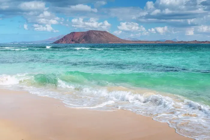 Framed Print : View of Lobos Island from beach in Corralejo, Corralejo Natural Park, Fuerteventura, Canary Islands, Spain Framed Print : View of Lobos Island from beach in Corralejo, Corralejo Natural Park, Fuerteventura, Canary Islands, Spain