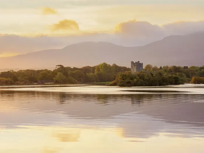 Framed Print : View over Loch Lein towards the Ross Castle at sunrise, Killarney National Park, County Kerry, Ireland