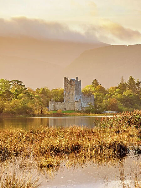 View over Loch Lein towards the Ross Castle at sunrise, Killarney National Park, County Kerry, Ireland