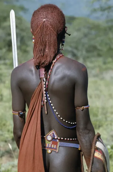 Framed Print : A back view of a Msai warrior resplendent with long Framed Print : A back view of a Msai warrior resplendent with long