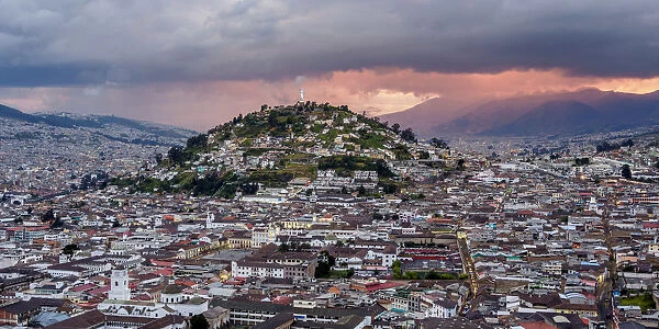View over Old Town towards El Panecillo Hill at sunset, Quito, Pichincha Province