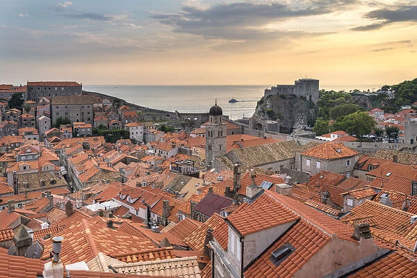 View of the old town at sunset, with Franciscan Monastery and Fort Lovrijenac. Dubrovnik