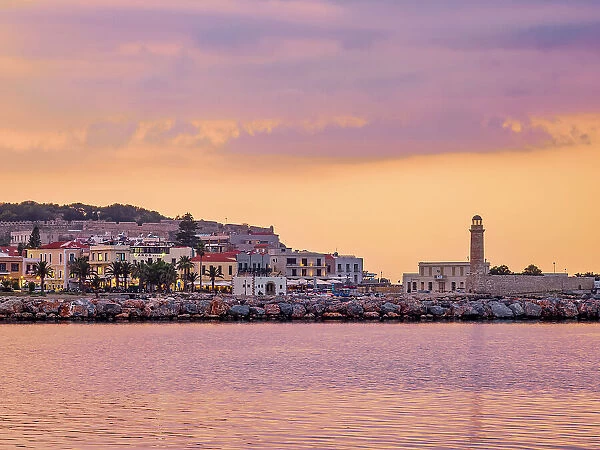 View towards the Old Venetian Port and Fortezza Castle, dusk, City of Rethymno, Rethymno Region, Crete, Greece