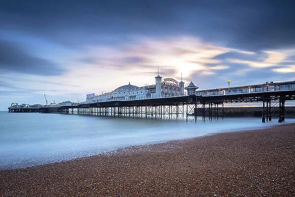 View of the Palace pier at sunset. Brighton, East Sussex, Southern England, United Kingdom