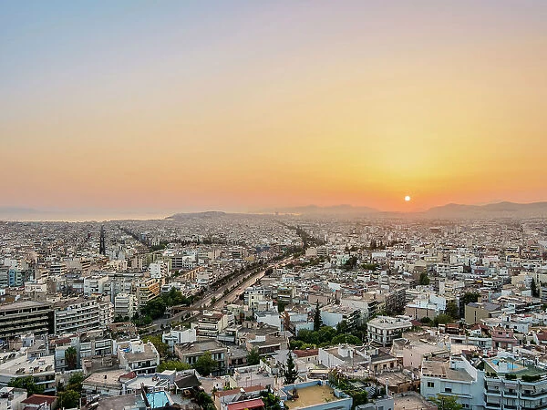 View from Philopappos Hill towards Kallithea at sunset, Athens, Attica, Greece