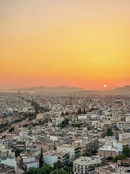 View from Philopappos Hill towards Kallithea at sunset, Athens, Attica, Greece