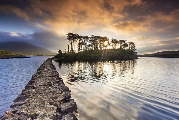 View of Pine Island on the Derryclare Lough lake at sunrise