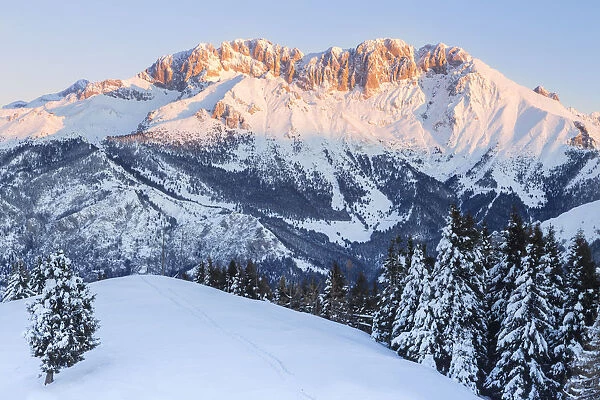 View of the Presolana during a winter sunrise from Monte Pora, Val Seriana, Bergamo district