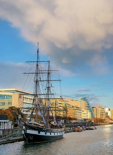 View over River Liffey towards The Jeanie Johnston Coffin Ship at sunset, Dublin, Ireland