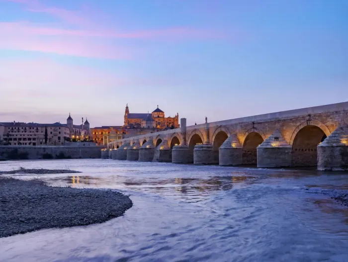 Framed Print : View over Roman Bridge of Cordoba and Guadalquivir River towards the Mosque Cathedral Framed Print : View over Roman Bridge of Cordoba and Guadalquivir River towards the Mosque Cathedral