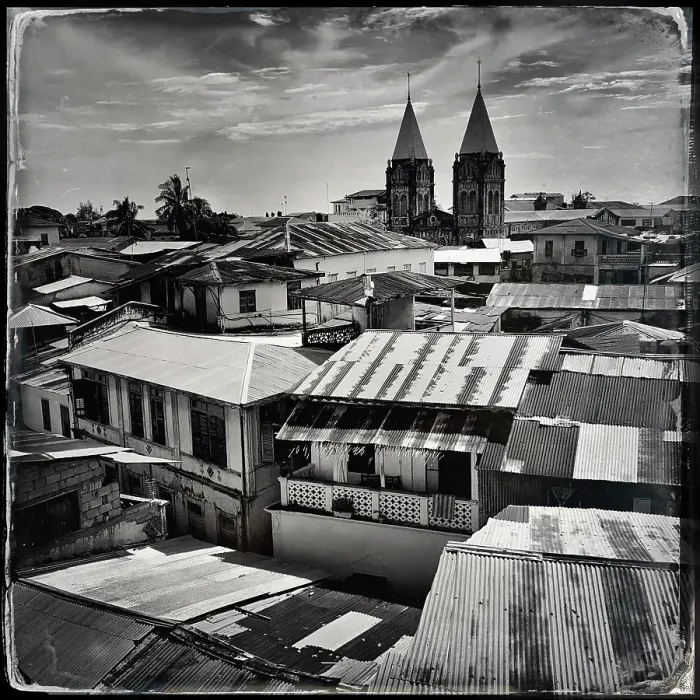 Framed Print : View over rooftops to St Joseph's Cathedral, Stonetown, Zanzibar, Tanzania Framed Print : View over rooftops to St Joseph's Cathedral, Stonetown, Zanzibar, Tanzania
