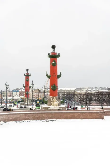 Framed Print : View towards Rostral Columns and the Spit of Vasilyevsky Island (Vasilyevsky Ostrov) in winter, Saint Petersburg, Russia