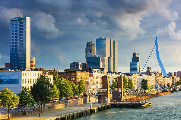 View of Rotterdam skyline with Erasmus bridge at sunset, Holland  /  Netherlands
