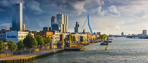 View of Rotterdam skyline with Erasmus bridge at sunset, Holland  /  Netherlands