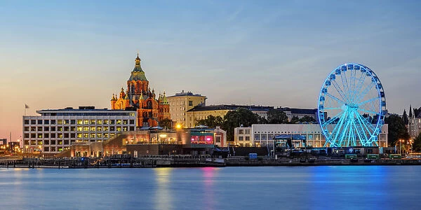 View over South Harbour towards Uspenski Cathedral, Allas Sea Pool and Restaurant and SkyWheel Ferris Wheel, dusk, Helsinki, Uusimaa County, Finland