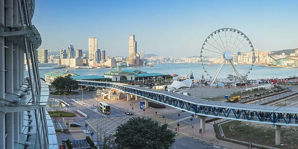 View of Star Ferry pier, observation wheel and Tsim Sha Tsui skyline, Hong Kong, China