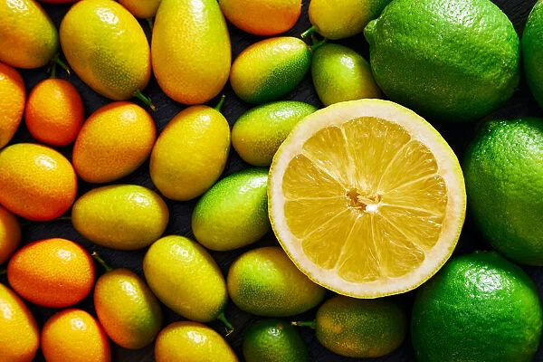Top view of texture of lemon fruit with a background of citrus fruits