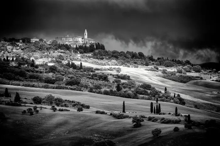 Framed Print : View across the Val d'Orcia towards Pienza beneath a dark, stormy sky, Tuscany, Italy Framed Print : View across the Val d'Orcia towards Pienza beneath a dark, stormy sky, Tuscany, Italy