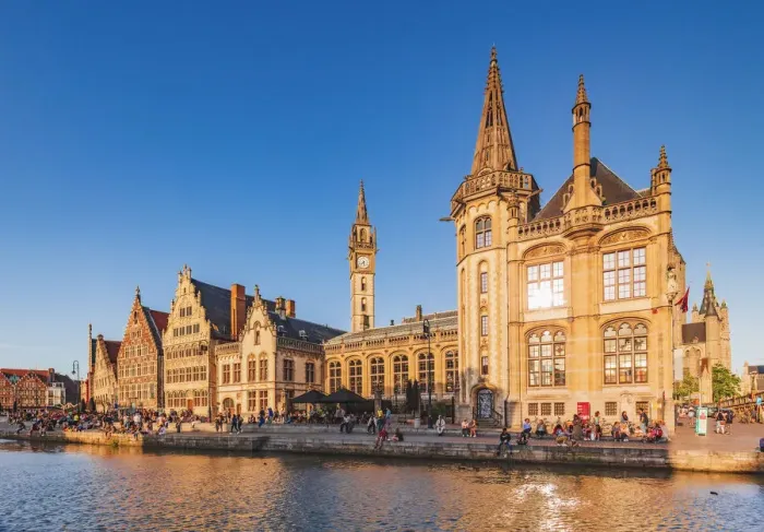 Framed Print : View of the waterfront buildings in Ghent reflecting in the water canal at sunset Framed Print : View of the waterfront buildings in Ghent reflecting in the water canal at sunset