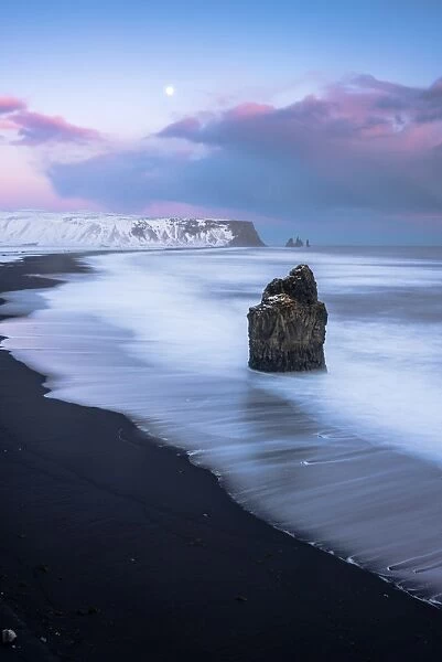 Vik, Southern Iceland, Europe. The black beach of Reynisfjara on a winter sunset