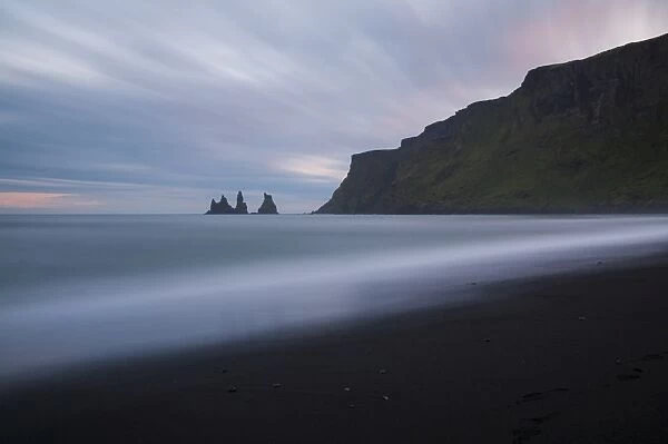 Vik, southern Iceland. Reynisfjara rock formations and black sand beach