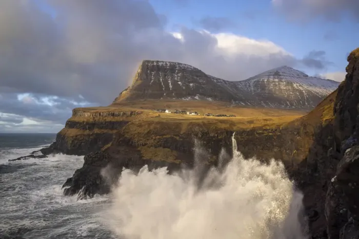 Framed Print : The village of Gasadalur and its waterfal hit by a storm. Island of Vagar. Faroe Islands Framed Print : The village of Gasadalur and its waterfal hit by a storm. Island of Vagar. Faroe Islands