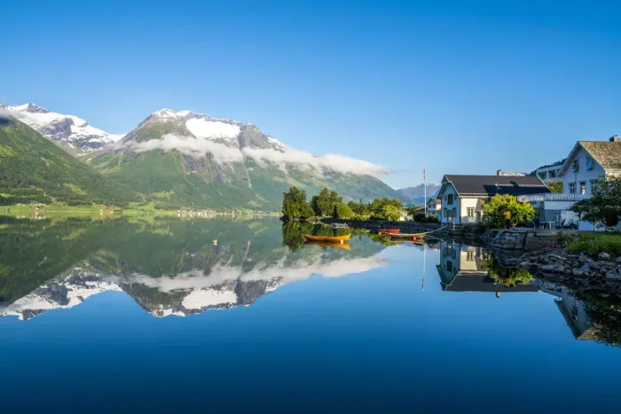 Framed Print : Village of Hjelle and mountains mirrored in Oppstrynsvatn lake, Oppstryn Framed Print : Village of Hjelle and mountains mirrored in Oppstrynsvatn lake, Oppstryn