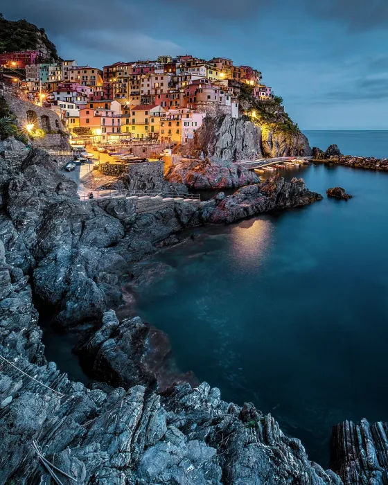 Framed Print : The village of Manarola at dusk, Cinque Terre, La Spezia district, Liguria, Italy Framed Print : The village of Manarola at dusk, Cinque Terre, La Spezia district, Liguria, Italy