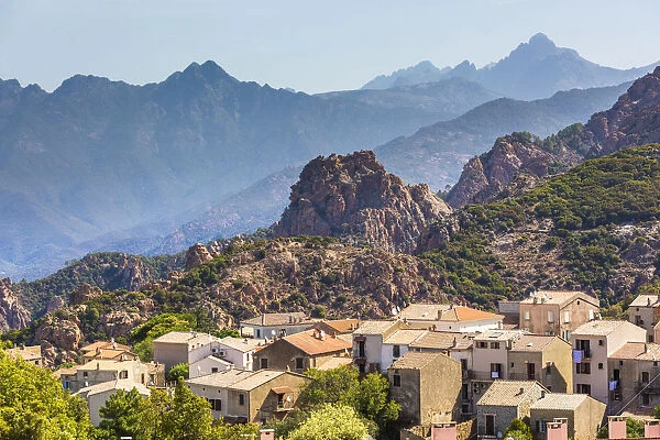 Village of Piana with mountains in the background, Southern Corsica, France