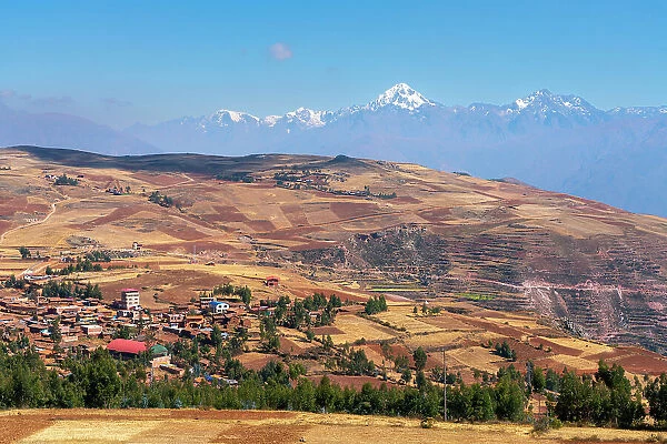 Village Racchi near Chinchero with distant views of snowcapped Andes mountains, Sacred Valley, Urubamba Province, Cusco Region, Peru