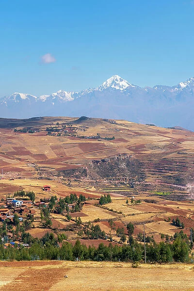 Village Racchi near Chinchero with distant views of snowcapped Andes mountains, Sacred Valley, Urubamba Province, Cusco Region, Peru