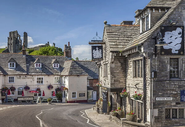 Village street in Corfe Castle, Dorset, England