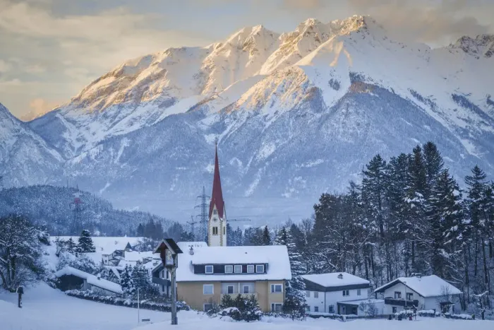 Framed Print : The village of Vill in winter with the Nordkette in the background, Innsbruck, Tyrol Framed Print : The village of Vill in winter with the Nordkette in the background, Innsbruck, Tyrol